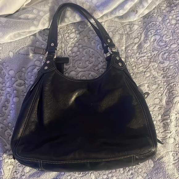 I’m selling authentic coach purse it’s black. - Picture 7 of 8